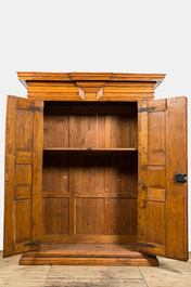 A wooden two-door cabinet, ca. 1700