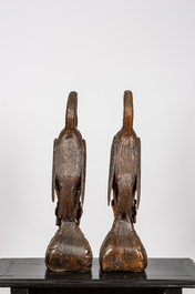 A pair of polychrome wooden flamingos, 20th C.