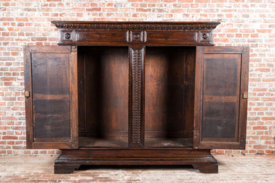 An Italian walnut two-door cabinet, Tuscany, 18th C.