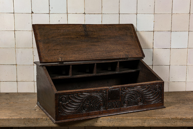 An English carved oak writing box monogrammed AW, 18th C.