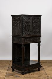 A neoclassical ebonised wooden cabinet on foot with an interior with parquetry and polychrome design, 18th C. and later