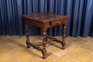 An oak wooden side table with a drawer, 18th C.