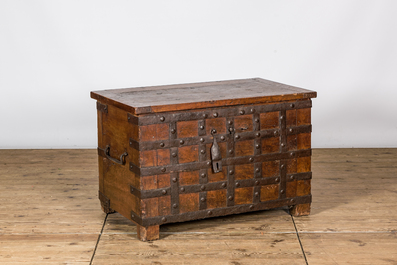 A wrought iron-mounted wooden coffer, 17th C.