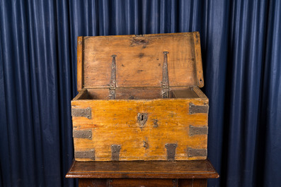 A wooden trunk with wrought iron mounts, 18th C.