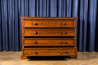 A walnut four-drawer commode, 19th C.