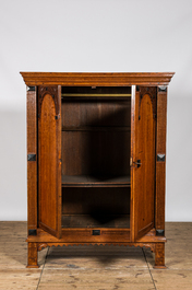 A Dutch oak two-door cupboard with ebonised elements, 17th C.