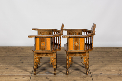 A North African salon set comprising a sofa and two armchairs with intarsia, 20th C.