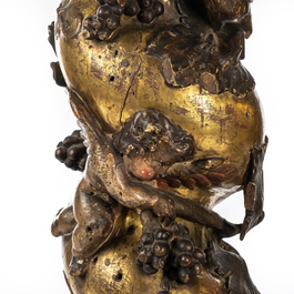 A pair of twisted and partly gilt wooden columns with birds and grapevines, prob. Italy, 17/18th C.