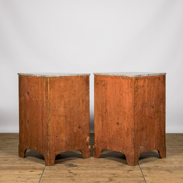 A pair of French mahogany corner cabinets with marble tops, 18/19th C.