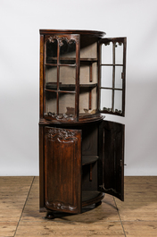 A Louis XV-style walnut corner display cabinet, 19th C.