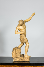 A patinated plaster sculpture of a young man on a raft, 20th C.