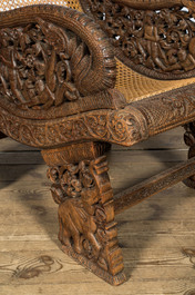 An oak wooden open worked colonial armchair with 'cannage', 19/20th C.