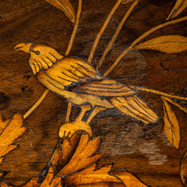 A four-drawer table cabinet with floral marquetry, probably The Netherlands, 18/19th C.