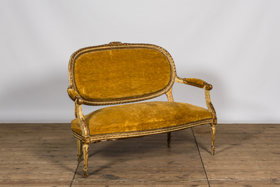 A French partly gilt and white patinated Louis XV-style sofa, 18/19th C.