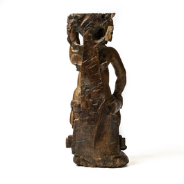 A wooden atlant in the shape of a kneeling boy, 17th C.