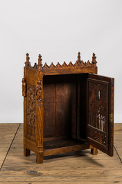 An attractive reticulated gothic wooden panel mounted in a Gothic Revival cabinet, 16th and 19th C.