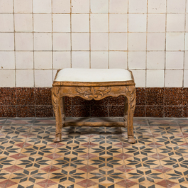 An upholstered wooden footstool and a stand, probably France, 18/19th C.