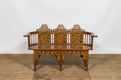 A North African salon set comprising a sofa and two armchairs with intarsia, 20th C.