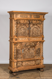 A German baroque leached walnut three-door cabinet, 18th C. with later elements
