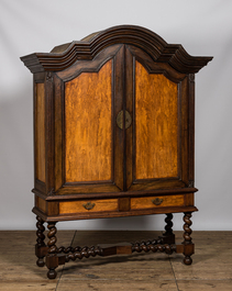 A mahogany two-door cabinet on foot, 19/20th C.