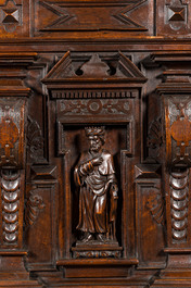 A walnut historicism cabinet on foot, 19th C.