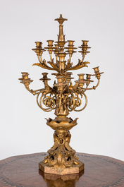 An impressive gilt wooden candlestick with gilt bronze sockets, 19/20th C.