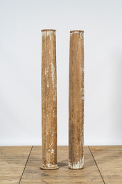 A pair of partly patinated wooden columns, 19th C.