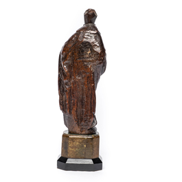 A carved oak figure of a bishop, 17th C.