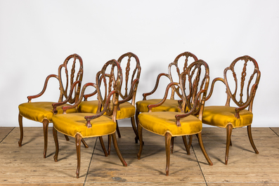 Six English polychrome and partly gilt George Hepplewhite style armchairs, 19th C.