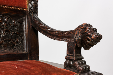 A pair of richly carved wooden hall benches, 19th C.