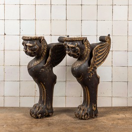 Two pairs of sculpted wooden table legs in the shape of lions, 19th C.