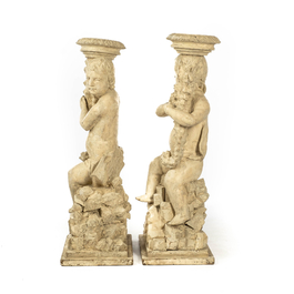 A pair of white patinated wooden putti holding a cornucopia, 18th C.