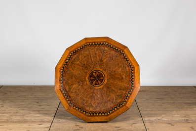 A dodecagonal tripod mahogany and root veneered parquetry table, 19th C.