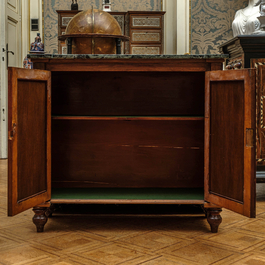 A mahogany low bookcase with a 'vert de mer' marble top, 19th C.