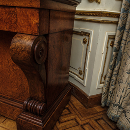 A French Empire-style rootwood veneered wooden console with a grey marble top, 19th C.