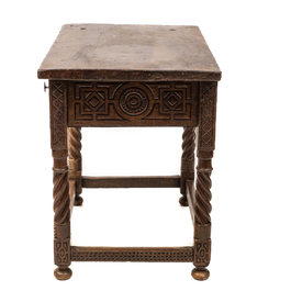 A Spanish walnut table with two drawers, 17th C. with later elements