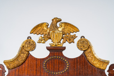 A gilt copper-mounted mahogany mirror with an American eagle, 19/20th C.