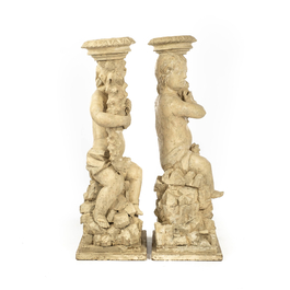 A pair of white patinated wooden putti holding a cornucopia, 18th C.