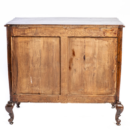 A French Louis XV-style walnut chest of drawers, 19th C.