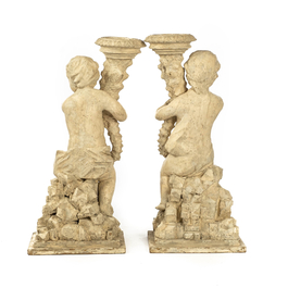 A pair of white patinated wooden putti holding a cornucopia, 18th C.