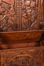 A pair of imposing wooden throne seats with relief design, 20th C.