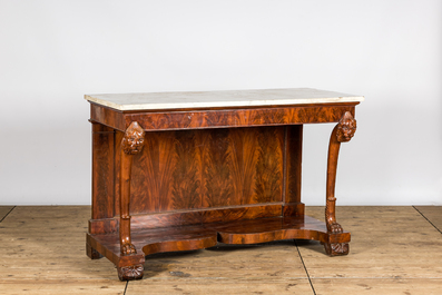 A large French mahogany console with lions' heads and marble top, 19th C.