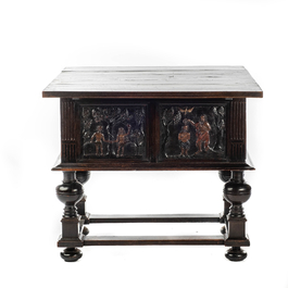 A rare ebonised wooden baluster leg table with polychromed reliefs, 17th C. with later elements