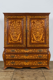 A Dutch mahogany floral marquetry cabinet with two doors and three drawers, 18/19th C.