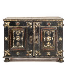 An ebonised and inlaid wooden cabinet, 19th C.