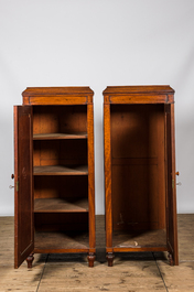 A pair of mahogany linen cupboards, ca. 1900