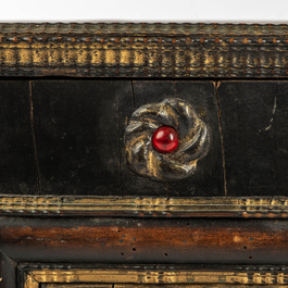 An ebonised and inlaid wooden cabinet, 19th C.