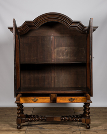 A mahogany two-door cabinet on foot, 19/20th C.