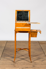 A fruitwood and burl wood veneered vanity set on foot, 20th C.