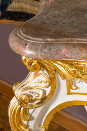 An attractive partly gilt wooden console table with marble top, Italy, 19th C.